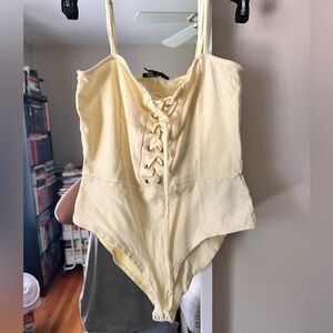 Yellow bodysuit